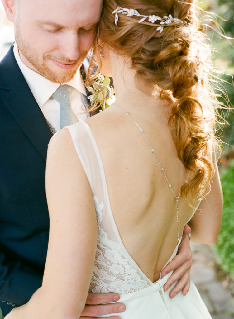 Bride and Groom Portrait at Main Street St. Charles Missouri; St. Louis film wedding photographer Erica Robnett Photography