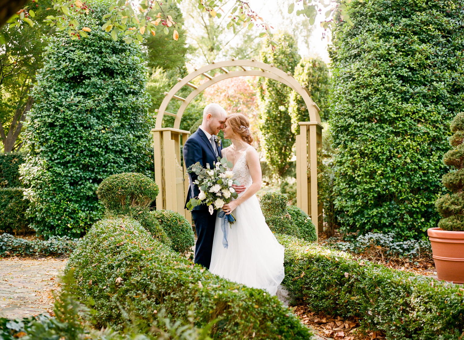 Bride and Groom Portrait at Main Street St. Charles Missouri; St. Louis film wedding photographer Erica Robnett Photography