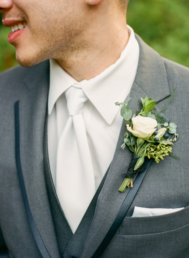 Groom's boutonniere; St. Louis fine art film wedding photographer Erica Robnett Photography