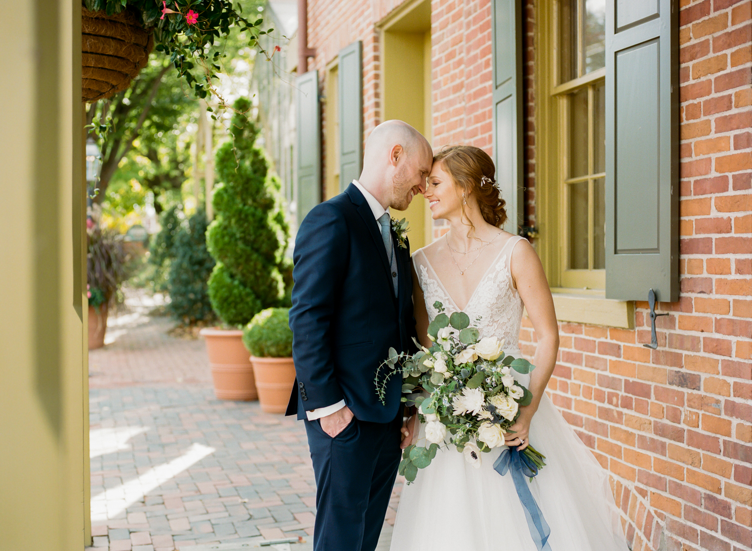 Bride and Groom Portrait at Main Street St. Charles Missouri; St. Louis wedding photographer