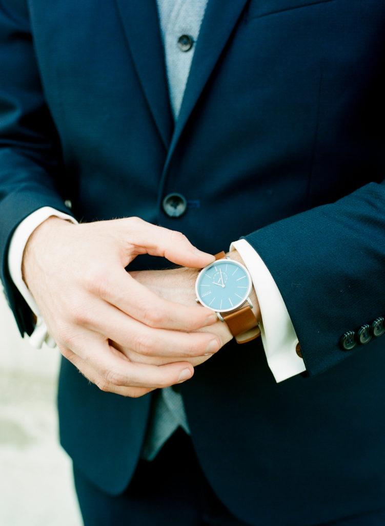 Groom getting ready; St. Louis wedding photographer