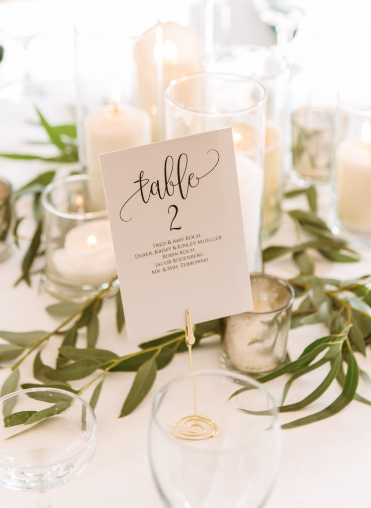 White and greenery reception decor at St. Louis wedding venue Windows on Washington