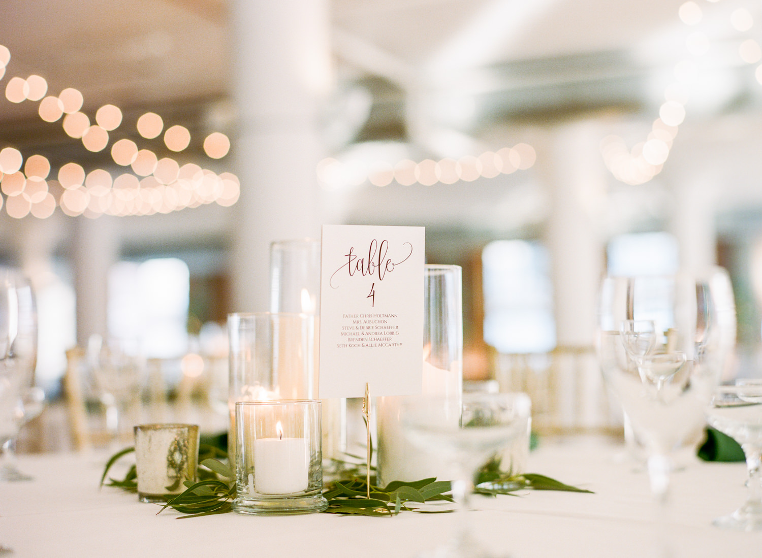White and greenery reception decor at St. Louis wedding venue Windows on Washington