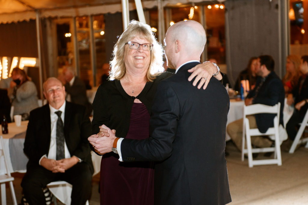 Groom and Mom dancing at St. Charles Missouri wedding venue Glenmark Farms