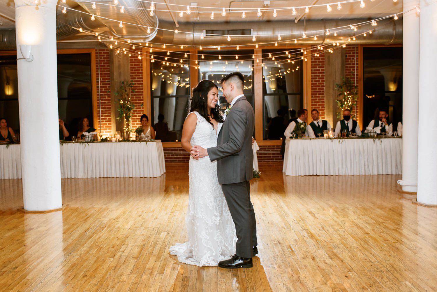 Bride and groom first dance at St. Louis wedding venue Windows on Washington