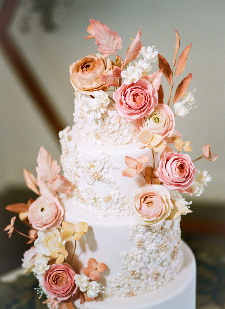 Pink and peach floral wedding cake; St. Louis wedding photographer Erica Robnett Photography
