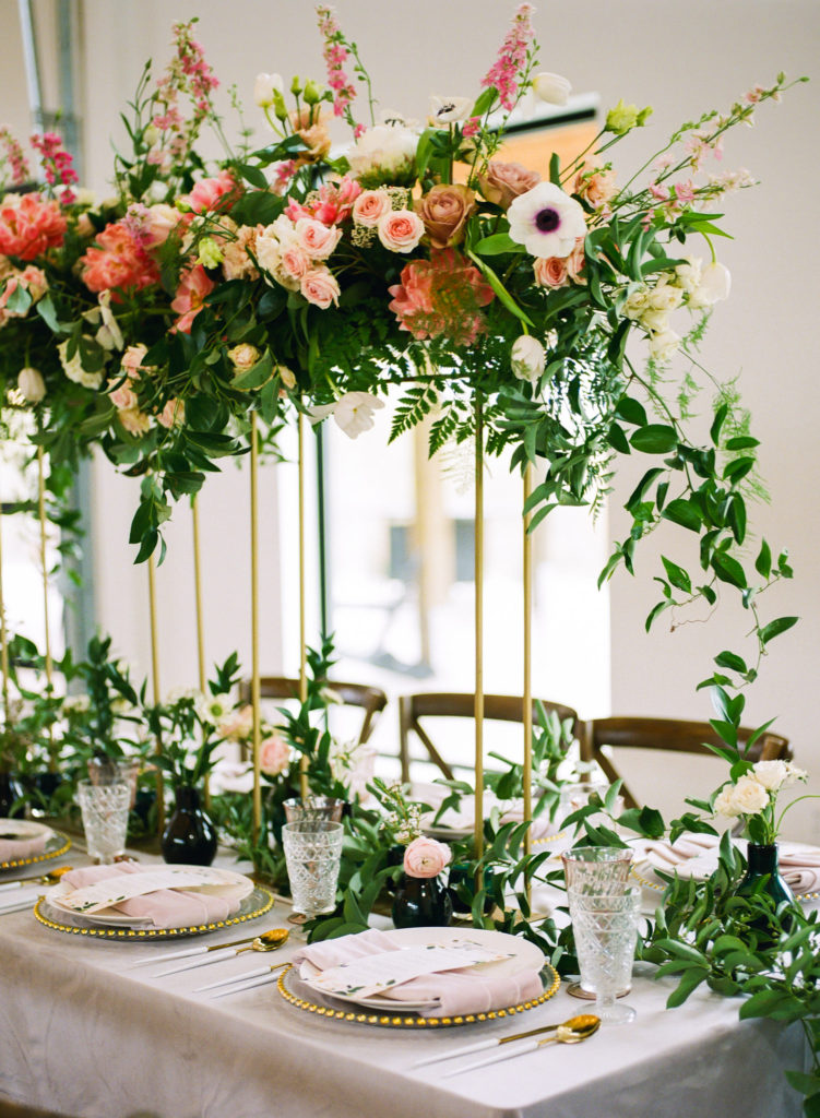 Pink and Lavendar floral wedding reception table decor; St. Louis wedding photographer Erica Robnett Photography