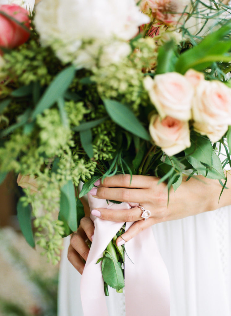 Bride with ring and bouquet; St. Louis wedding photographer Erica Robnett Photography