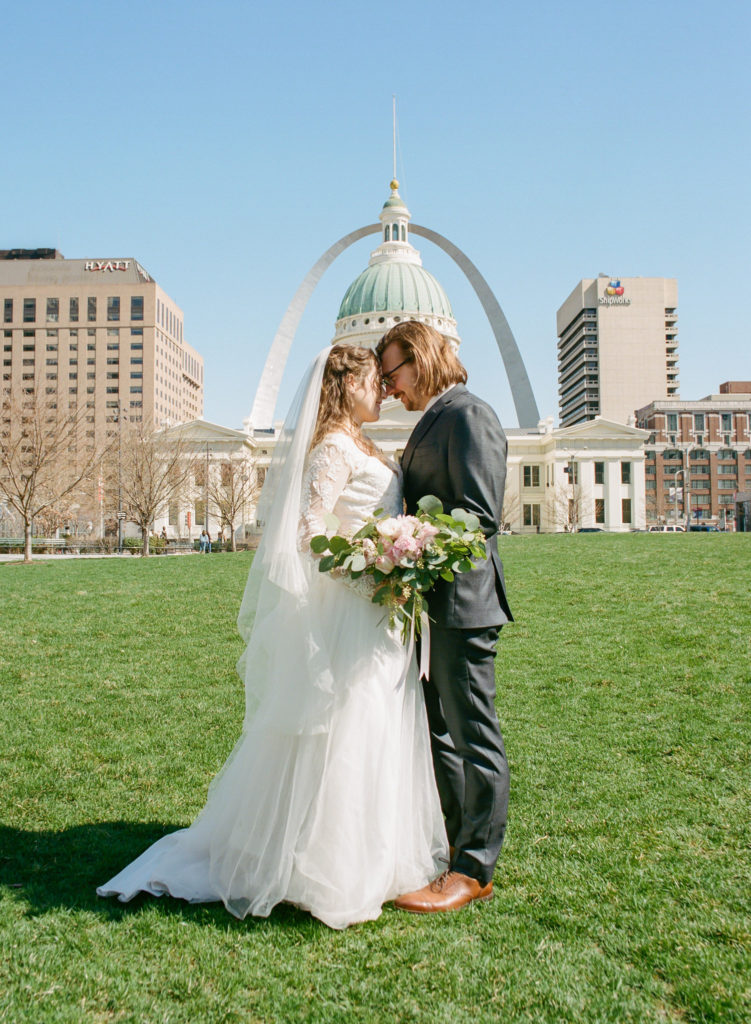 Bride and groom portrait at the St. Louis Arch; St. Louis wedding photographer Erica Robnett Photography