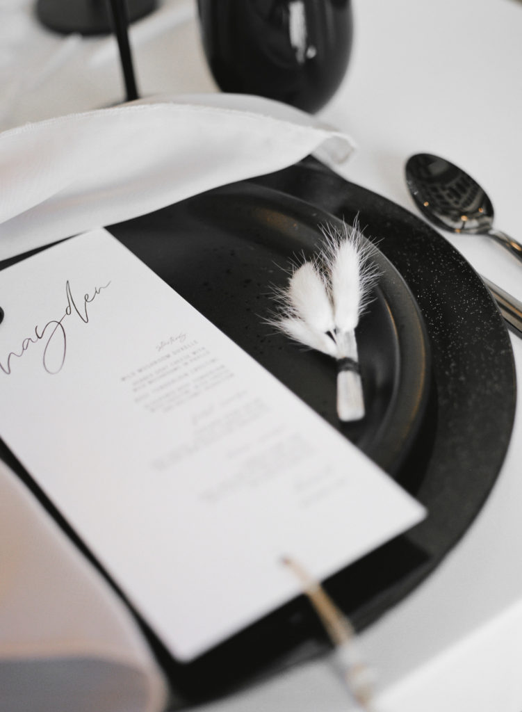 Black and white wedding place setting