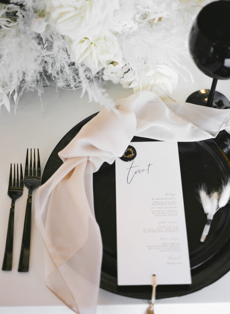 Black and white wedding place setting