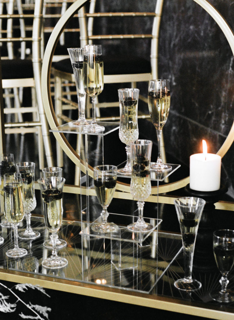 Gold, black and white wedding drink cart