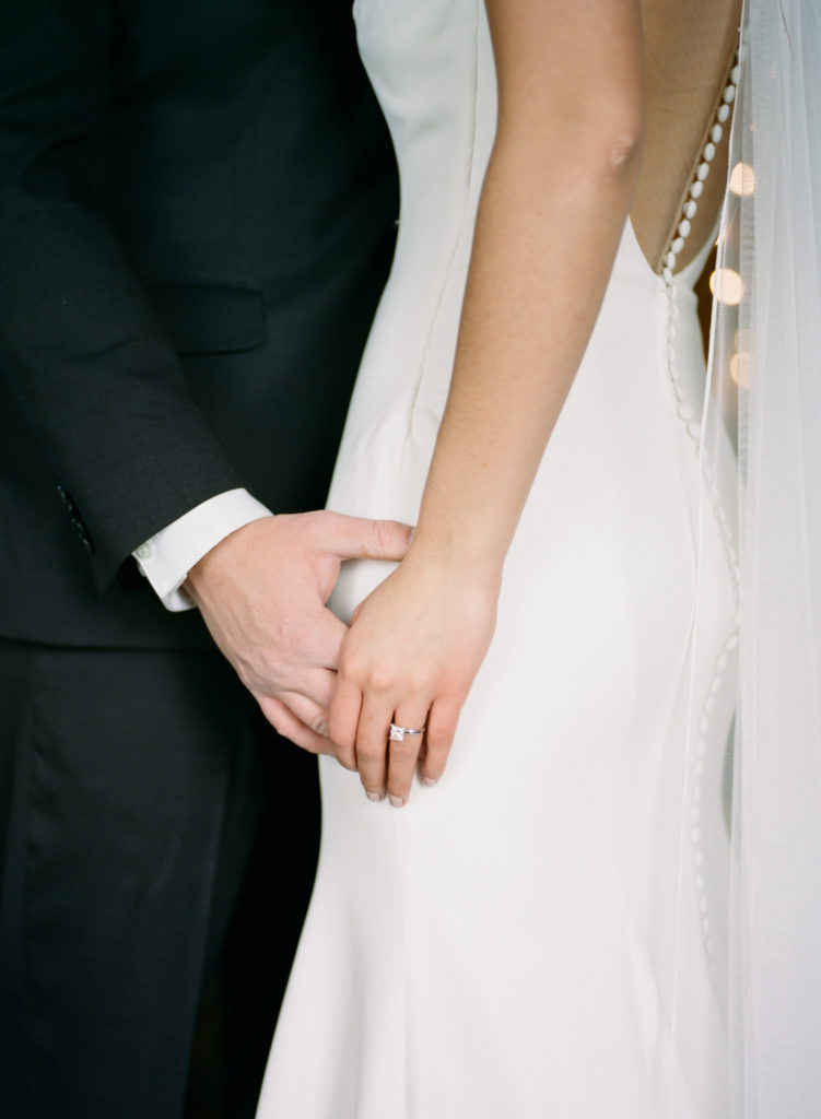 Bride and groom hands; St. Louis fine art film wedding photographer Erica Robnett Photography