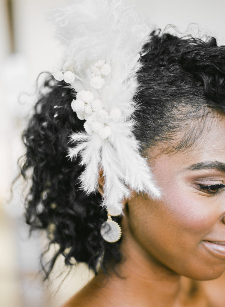 Bridal feather hairpiece; St. Louis wedding photographer