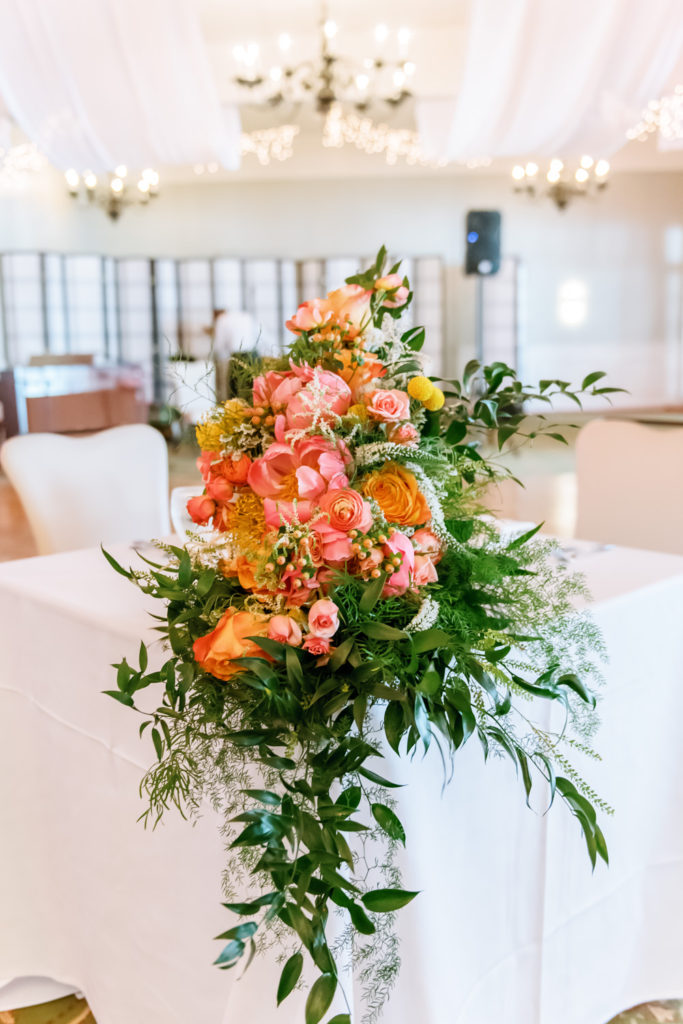 Pink and peach wedding florals; St. Louis wedding photographer