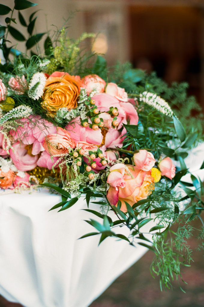 Pink and peach wedding florals; St. Louis fine art film wedding photographer