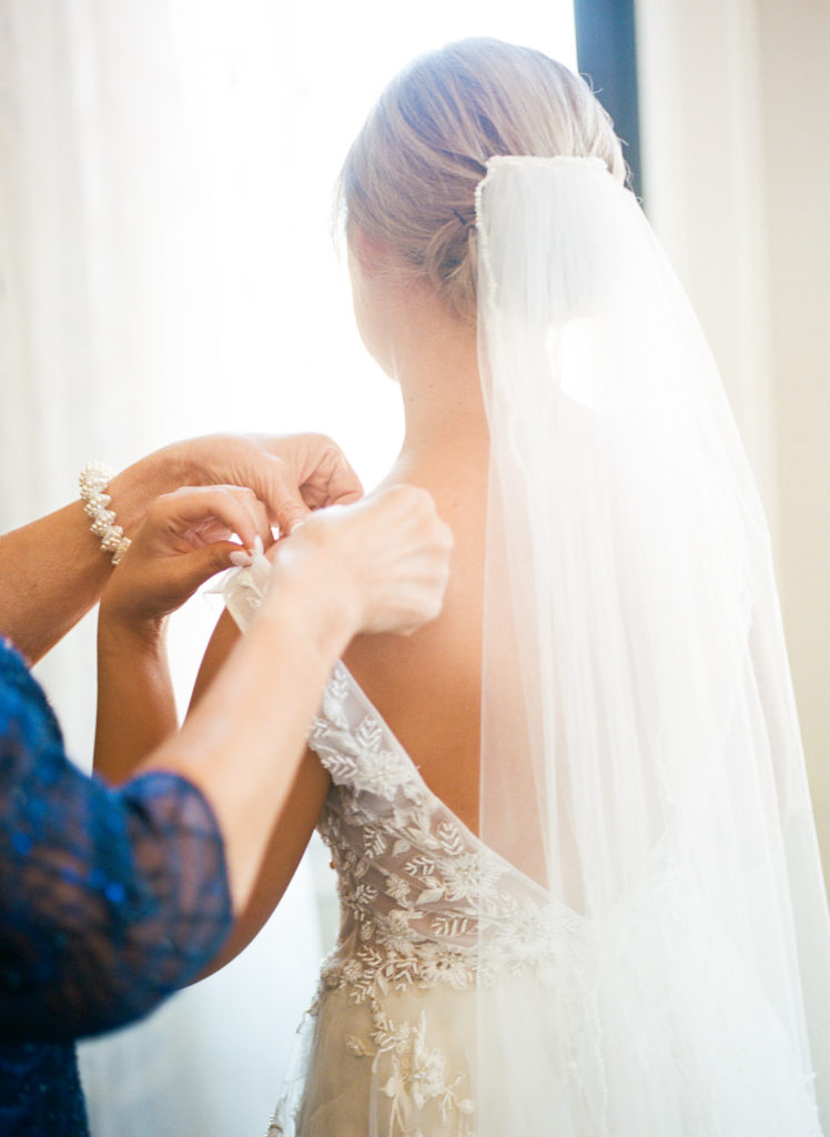 Bride getting ready; St. Louis fine art film wedding photographer Erica Robnett Photography