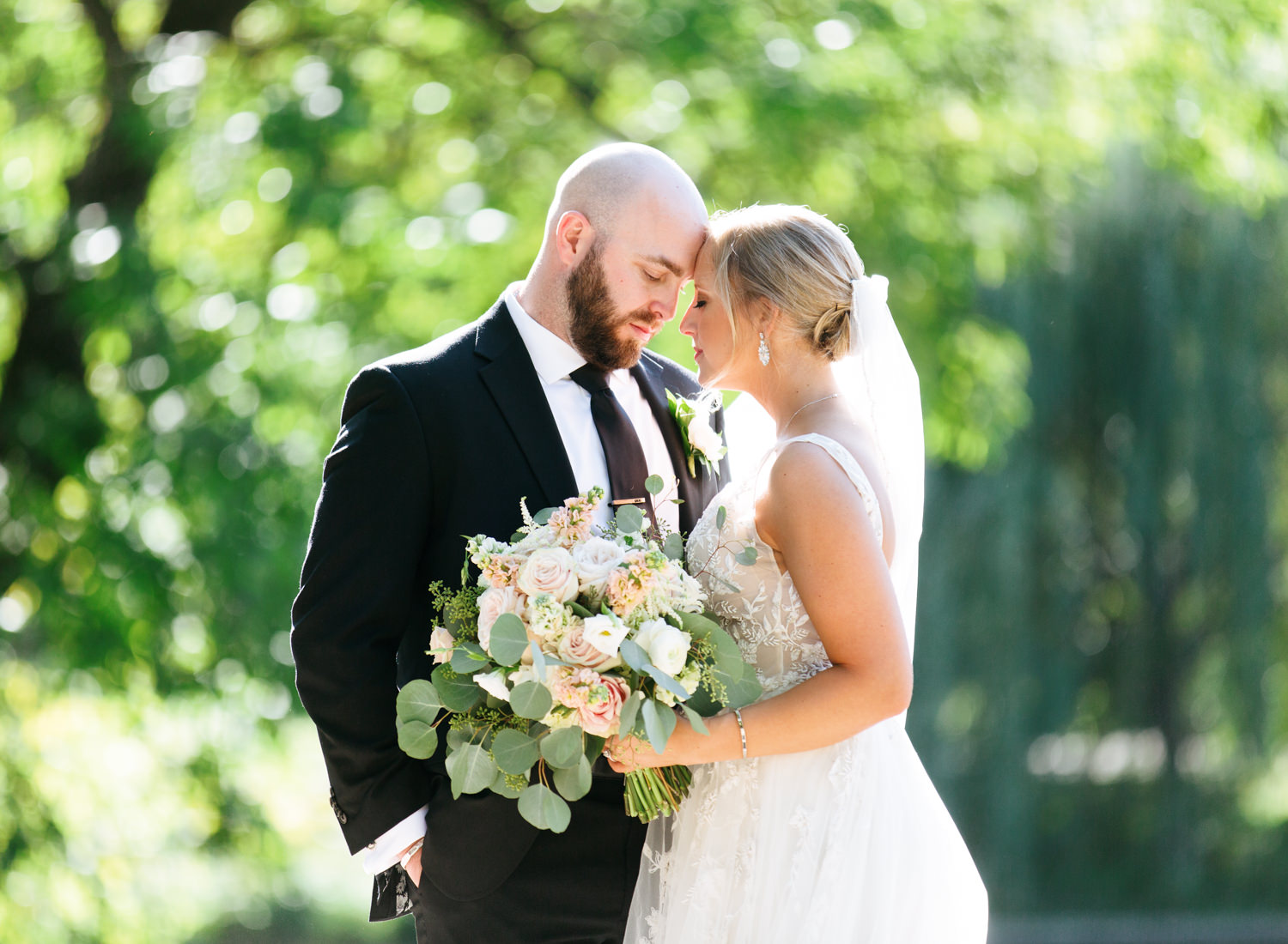 Bride and groom portrait at Lafayette Park; St. Louis fine art film wedding photographer